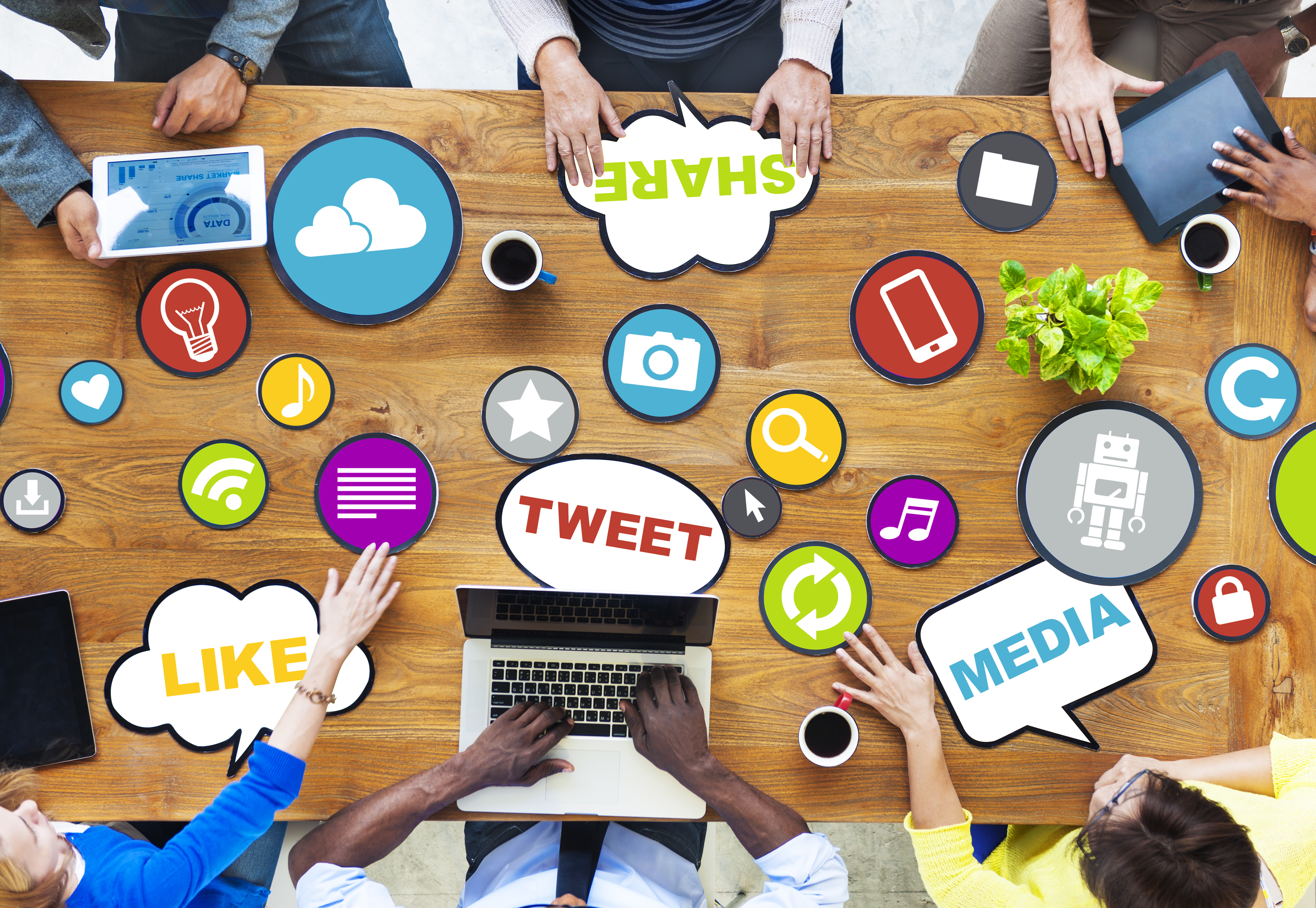 A photo of different social media apps on a table